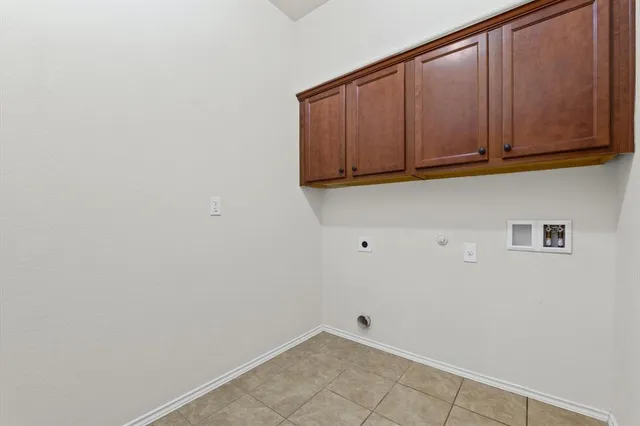 a white toilet sitting next to a white sink