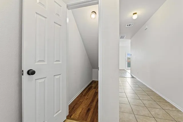 a view of a house with a backyard porch and sitting area