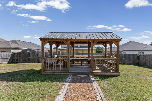 an aerial view of a house with a garden