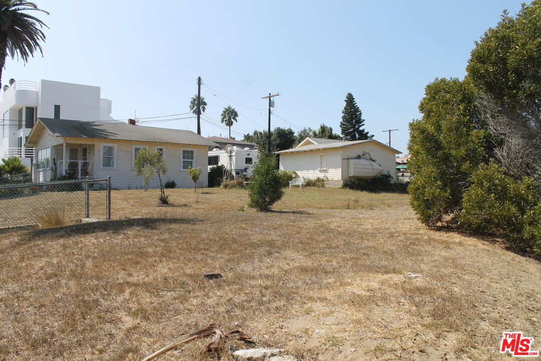 Undisclosed Address Santa Monica, CA 90405 - Photo 3 of 3 a front view of a house with a yard