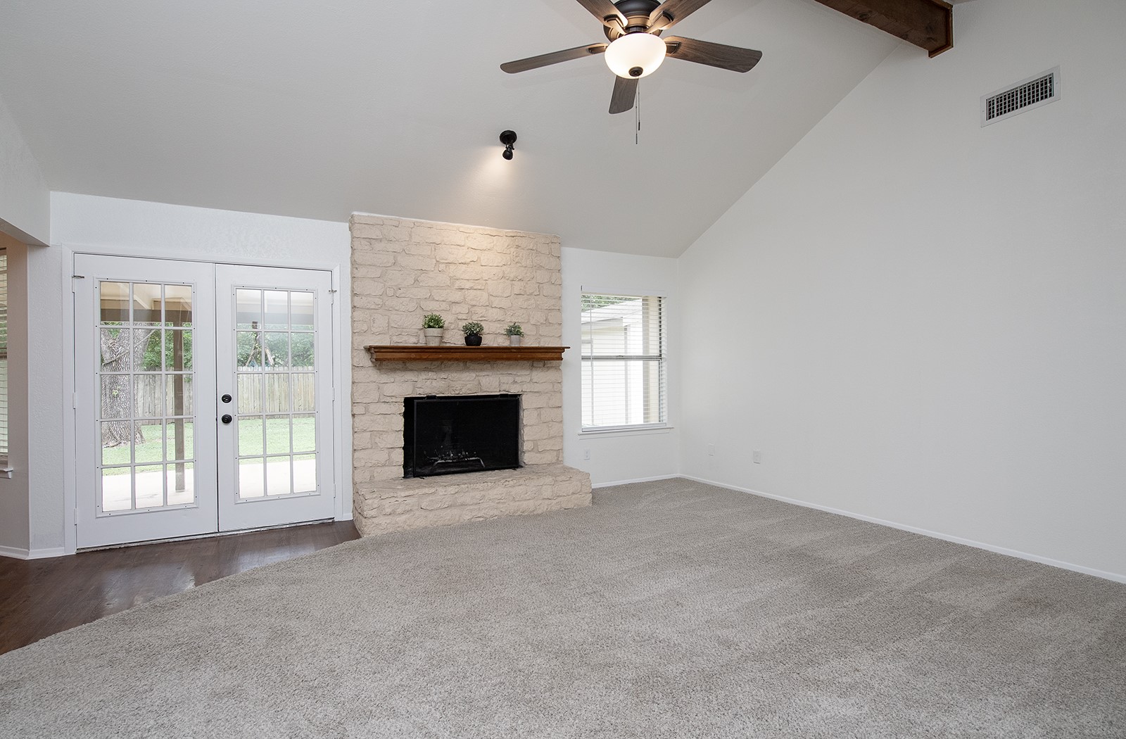 910 Garden View Drive Georgetown, TX 78628 - Photo 5 of 33 a view of an empty room with a fireplace