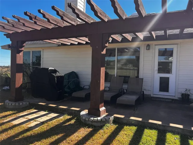 a view of a porch with furniture