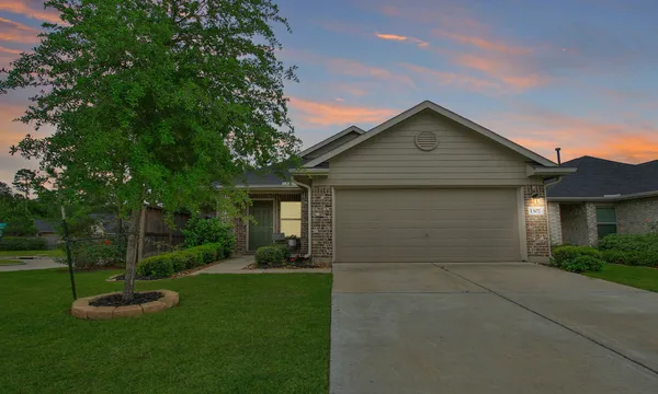 $245,000 | 1307 Winding Willow Drive, Pinehurst, TX 77362