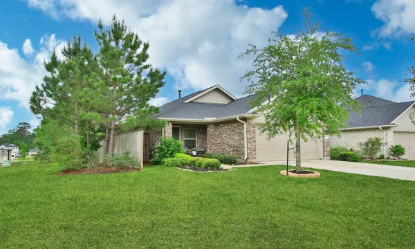 $245,000 | 1307 Winding Willow Drive, Pinehurst, TX 77362