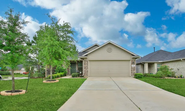 $245,000 | 1307 Winding Willow Drive, Pinehurst, TX 77362