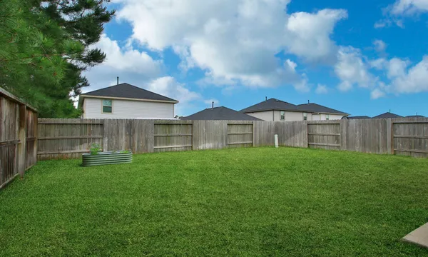 $245,000 | 1307 Winding Willow Drive, Pinehurst, TX 77362