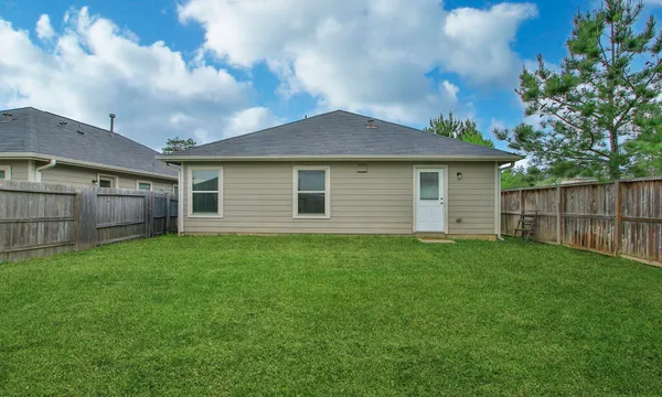 $245,000 | 1307 Winding Willow Drive, Pinehurst, TX 77362