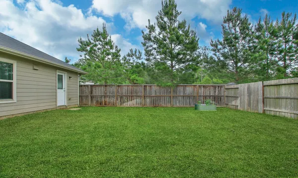 $245,000 | 1307 Winding Willow Drive, Pinehurst, TX 77362