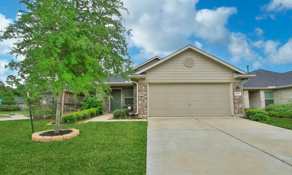 $245,000 | 1307 Winding Willow Drive, Pinehurst, TX 77362
