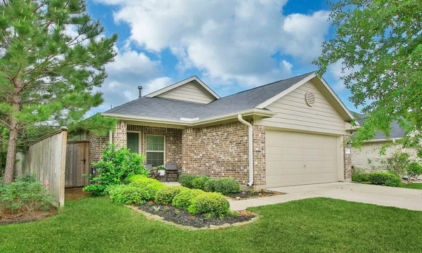 $245,000 | 1307 Winding Willow Drive, Pinehurst, TX 77362