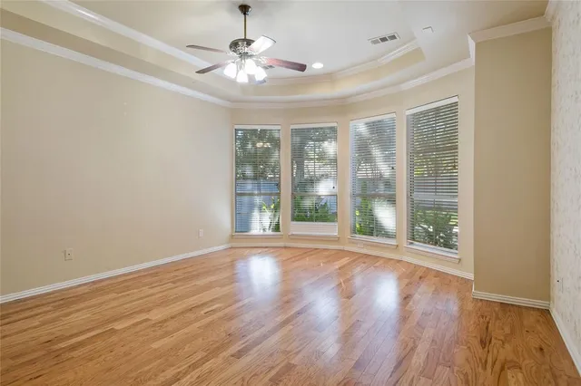 wooden floor in a hall with an entryway