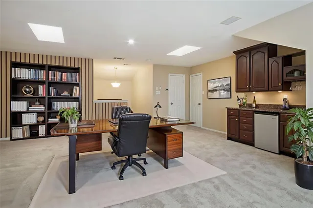 a view of a kitchen with a sink