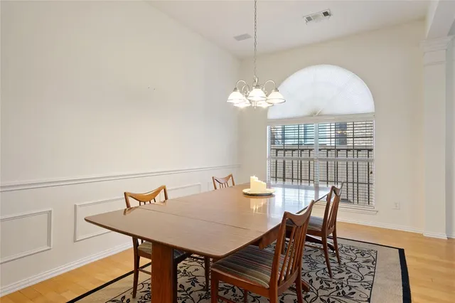 a kitchen with stainless steel appliances granite countertop a refrigerator a sink a stove a microwave and island