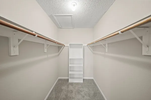 a view of an empty walk in closet