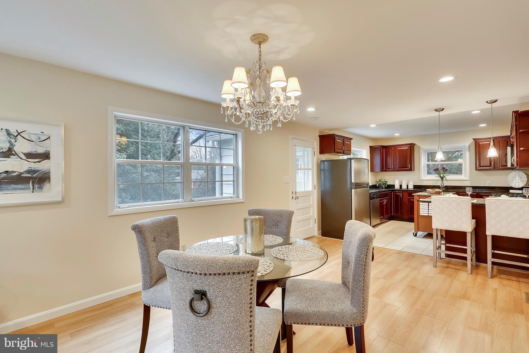 4717 Oxbow Road Rockville, MD 20852 - Photo 15 of 30 Dining Room with crystal chandelier.