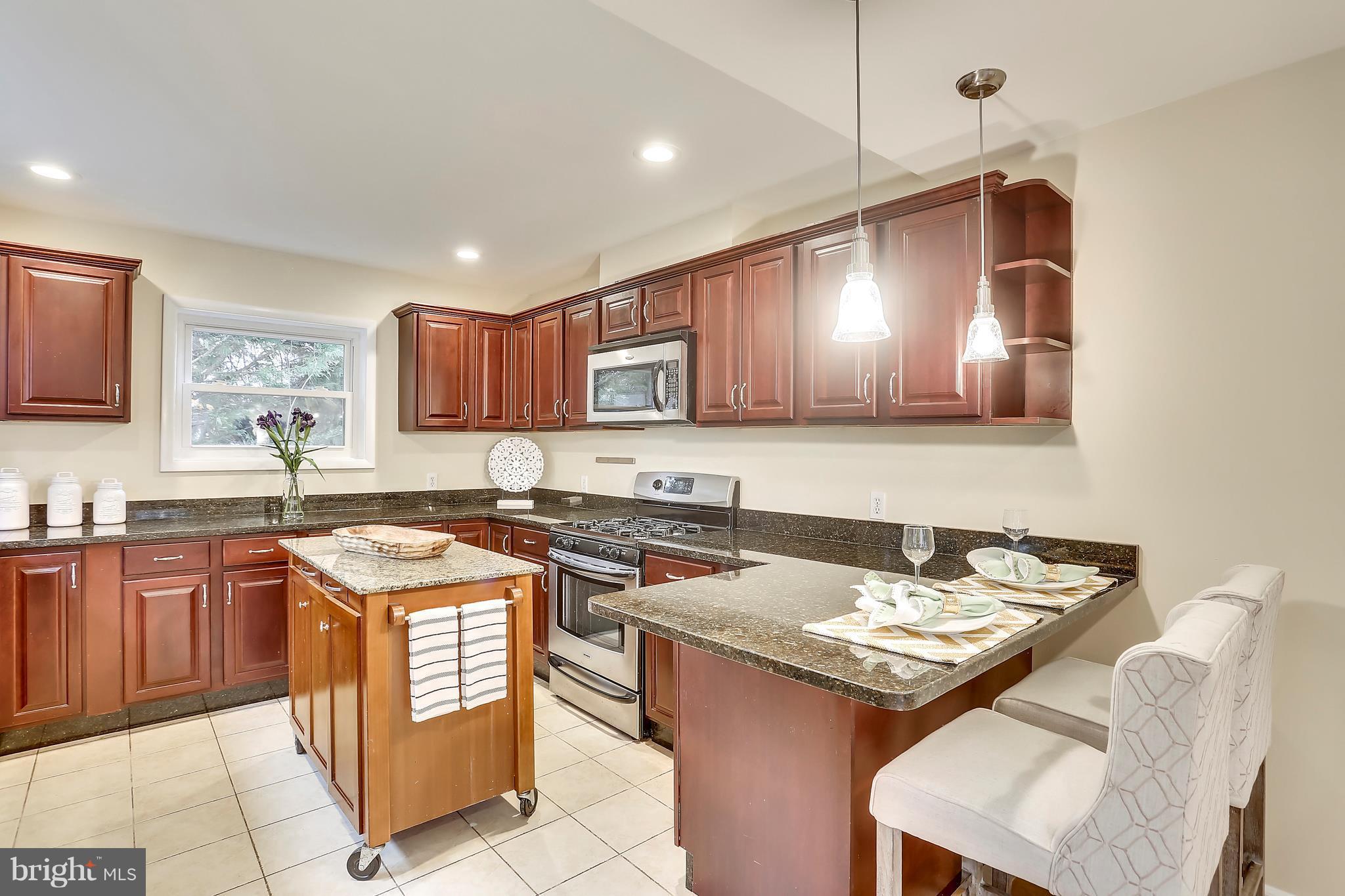 4717 Oxbow Road Rockville, MD 20852 - Photo 18 of 30 Tons of cabinets and counter space.