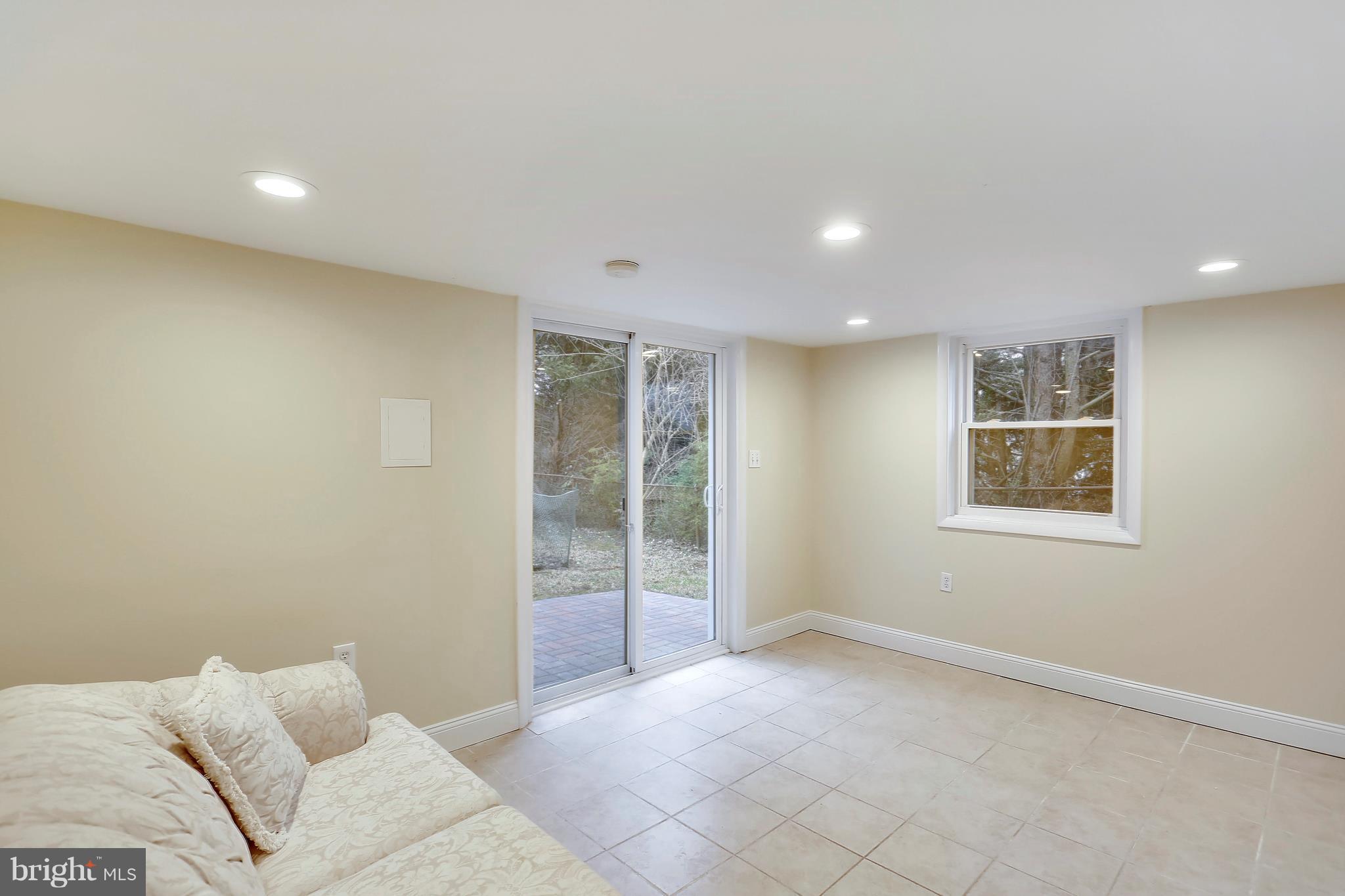 4717 Oxbow Road Rockville, MD 20852 - Photo 26 of 30 Lower level sunroom addition.