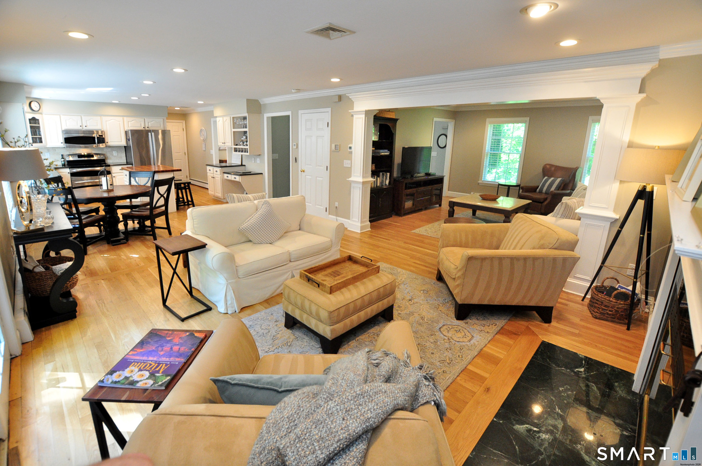 12 Revere Road Bridgewater, CT 06752 - Photo 13 of 40 a living room with furniture and a view of kitchen