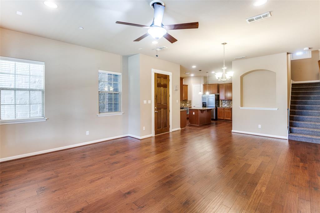 1915 Luther Road Irving, TX 75063 - Photo 4 of 25 wooden floor in an empty room with a window