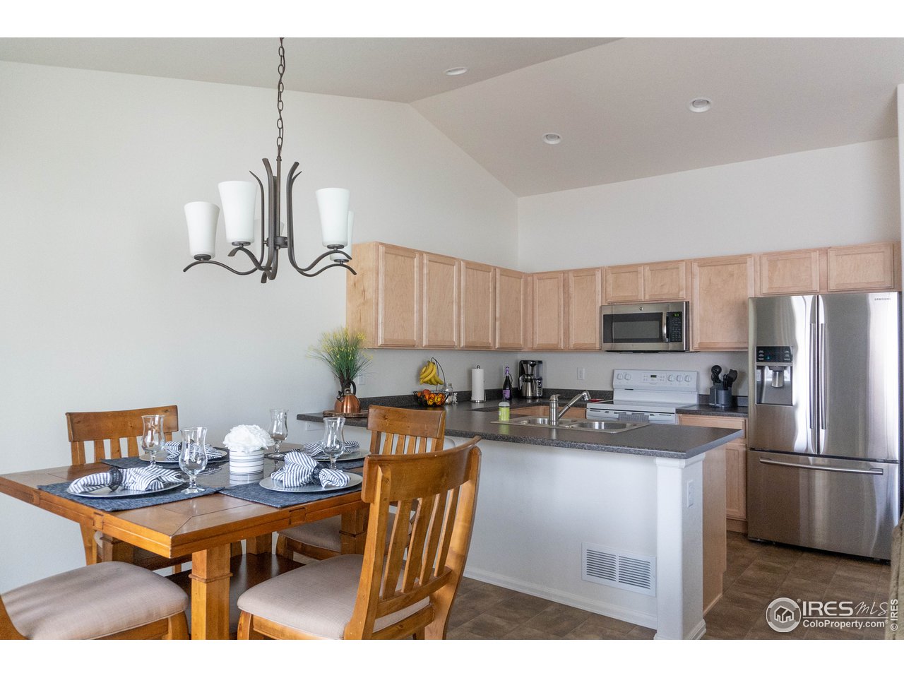 8726 13th St Road Greeley, CO 80634 - Photo 6 of 18 Open concept kitchen/dining