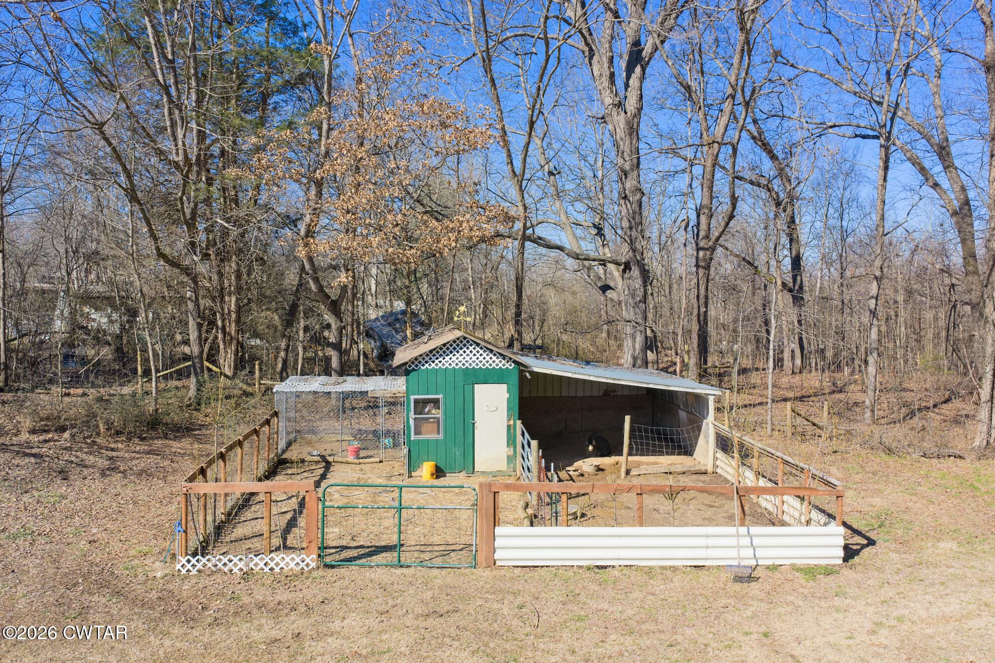 419 Hughes Road East Jackson, TN 38305 - Photo 11 of 39 a view of house with a yard and sitting area