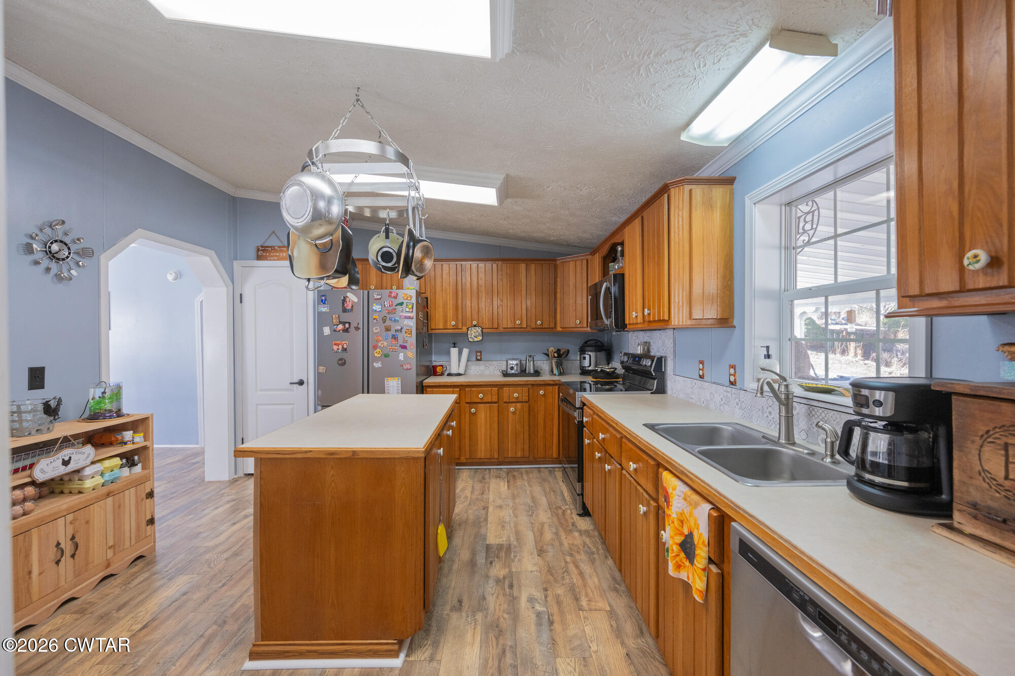 419 Hughes Road East Jackson, TN 38305 - Photo 15 of 39 a kitchen that has a lot of cabinets in it