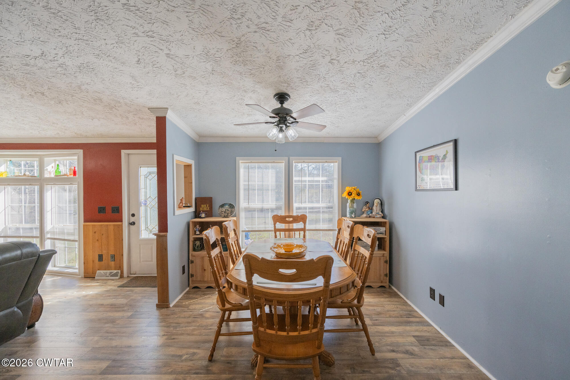 419 Hughes Road East Jackson, TN 38305 - Photo 17 of 39 a view of a dining room with furniture and wooden floor