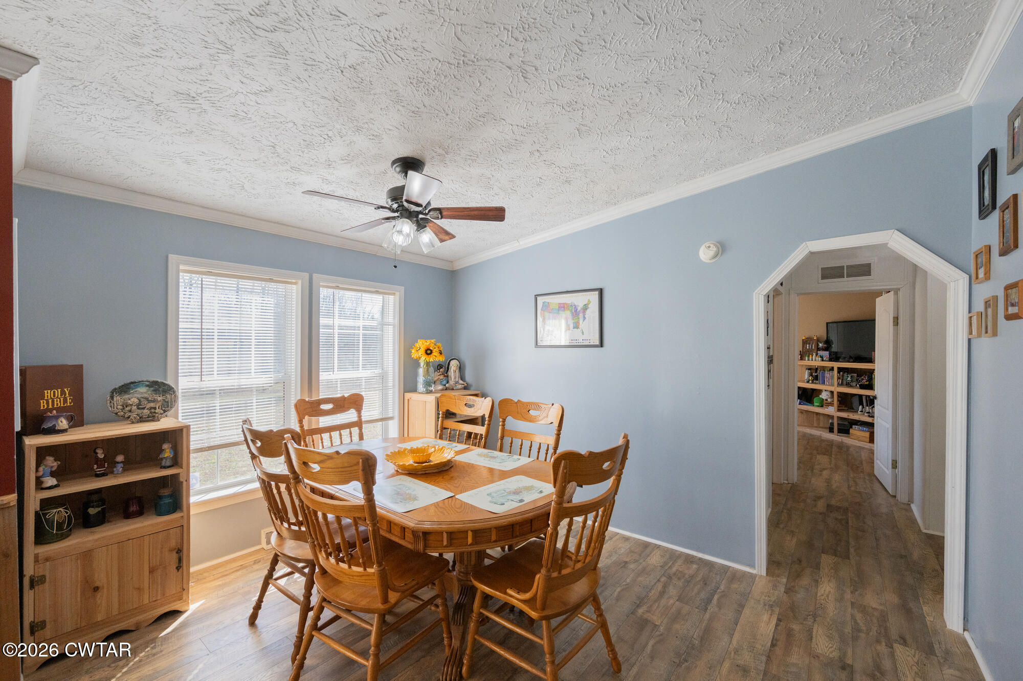 419 Hughes Road East Jackson, TN 38305 - Photo 18 of 39 a view of a dining room with furniture and wooden floor
