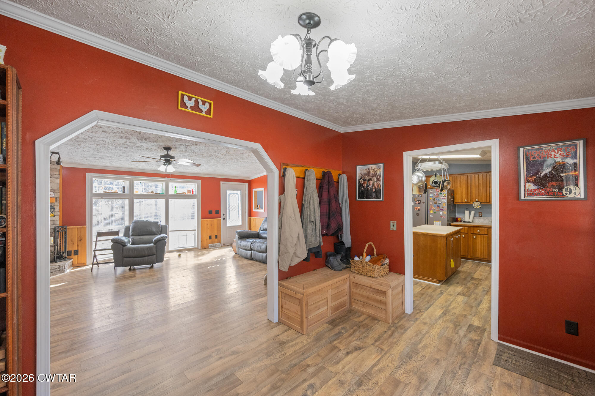 419 Hughes Road East Jackson, TN 38305 - Photo 20 of 39 a view of a dining room with furniture wooden floor and chandelier