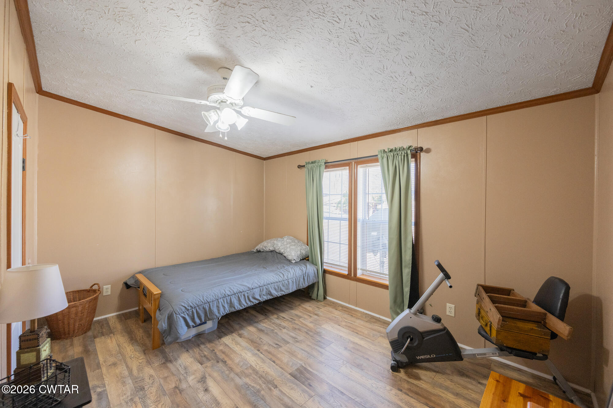 419 Hughes Road East Jackson, TN 38305 - Photo 27 of 39 a bedroom with furniture and a window