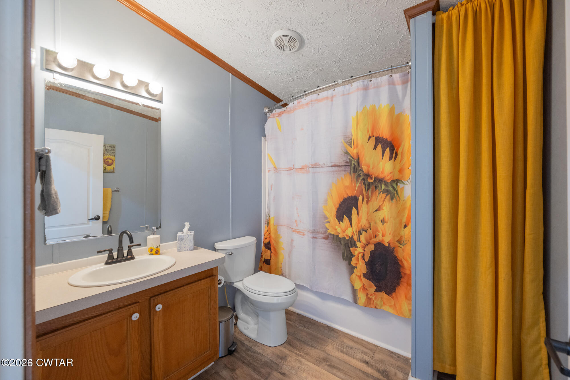 419 Hughes Road East Jackson, TN 38305 - Photo 28 of 39 a bathroom with a granite countertop sink toilet and shower
