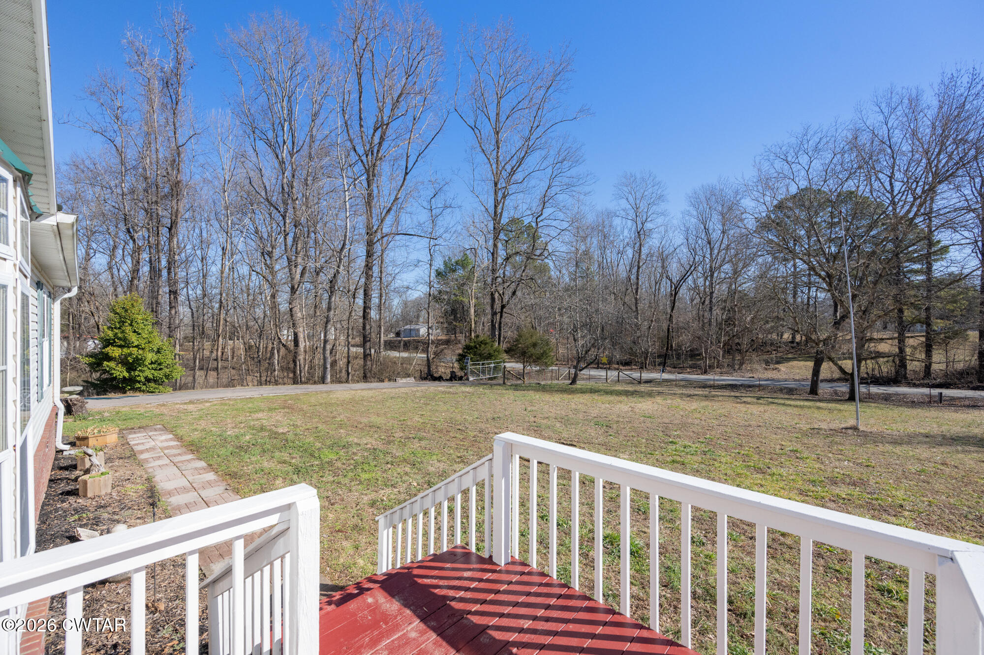 419 Hughes Road East Jackson, TN 38305 - Photo 30 of 39 a view of outdoor space with deck and yard