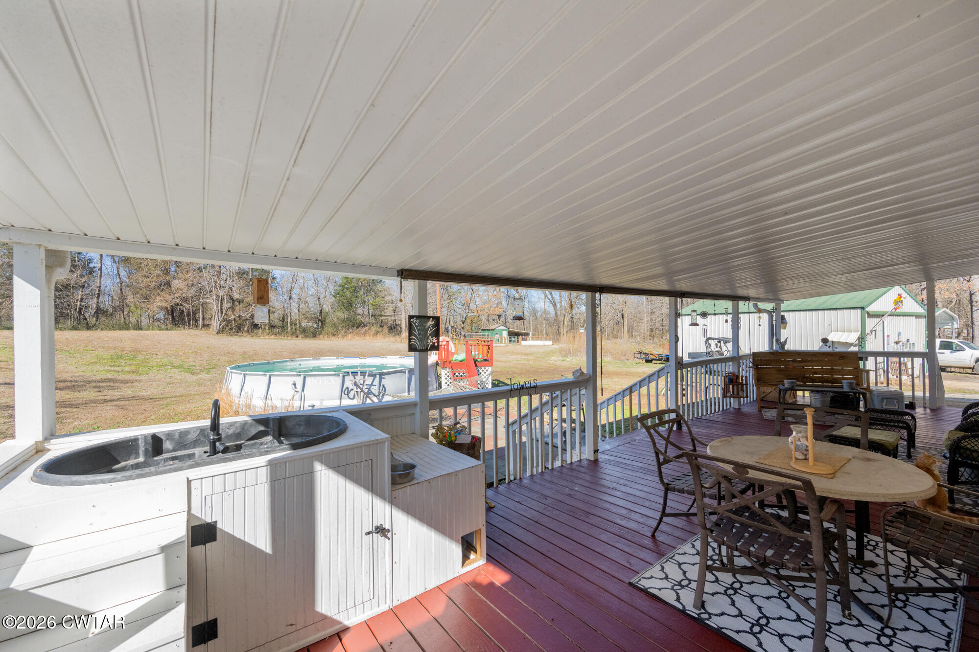 419 Hughes Road East Jackson, TN 38305 - Photo 32 of 39 a dining room with furniture and wooden floor