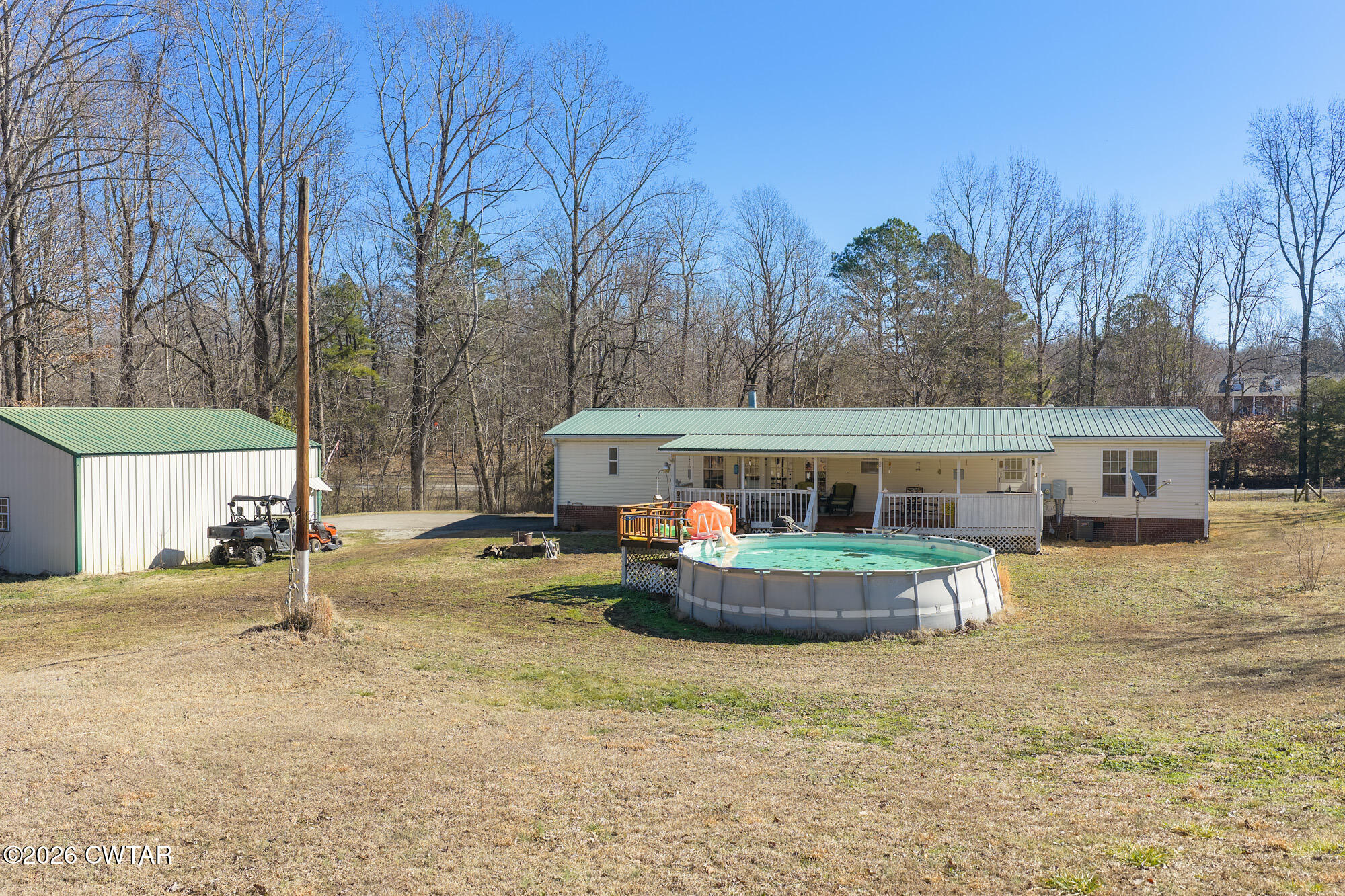 419 Hughes Road East Jackson, TN 38305 - Photo 6 of 39 a view of a house with backyard and sitting area