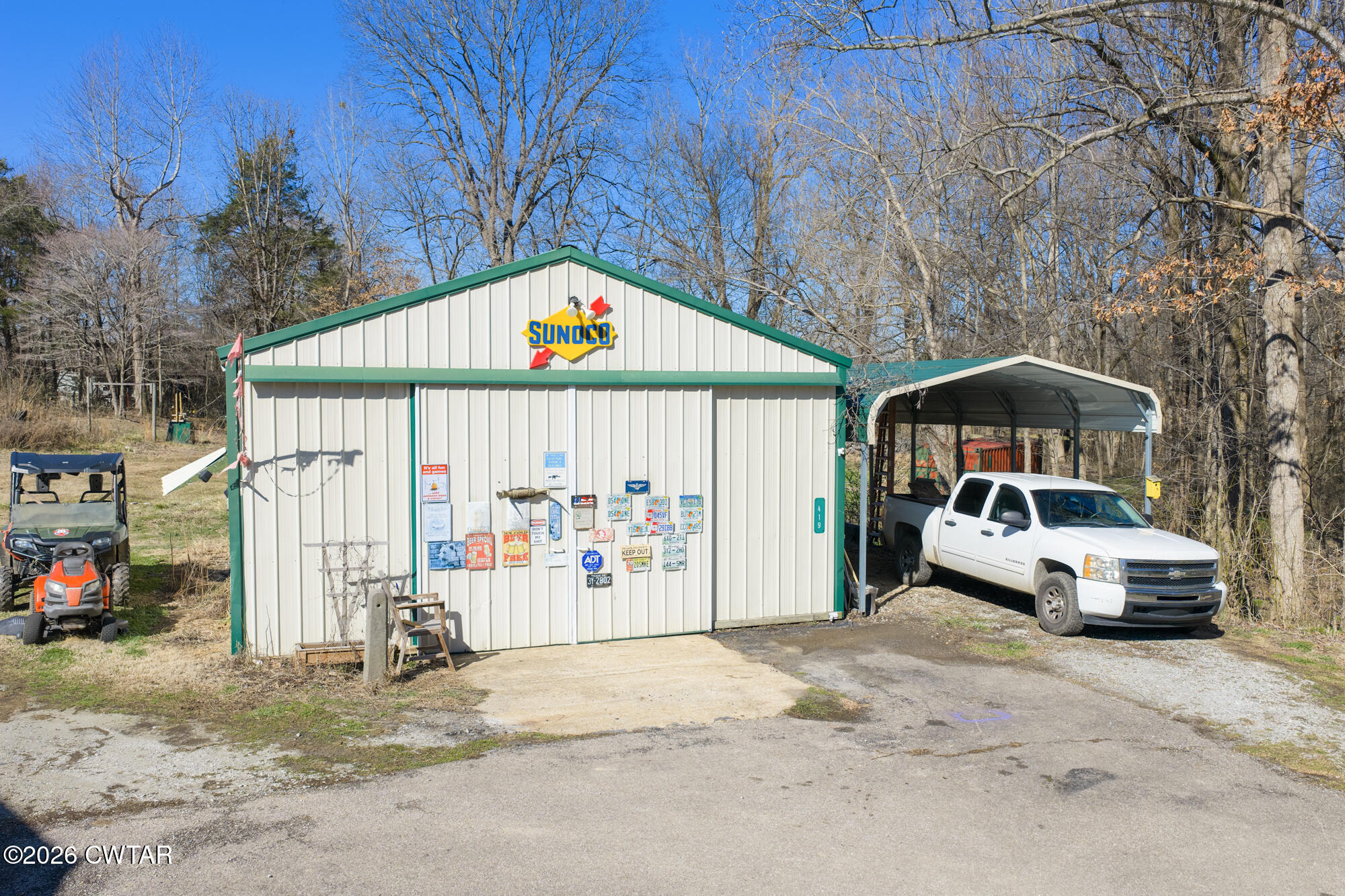 419 Hughes Road East Jackson, TN 38305 - Photo 9 of 39 a front view of a house with parking