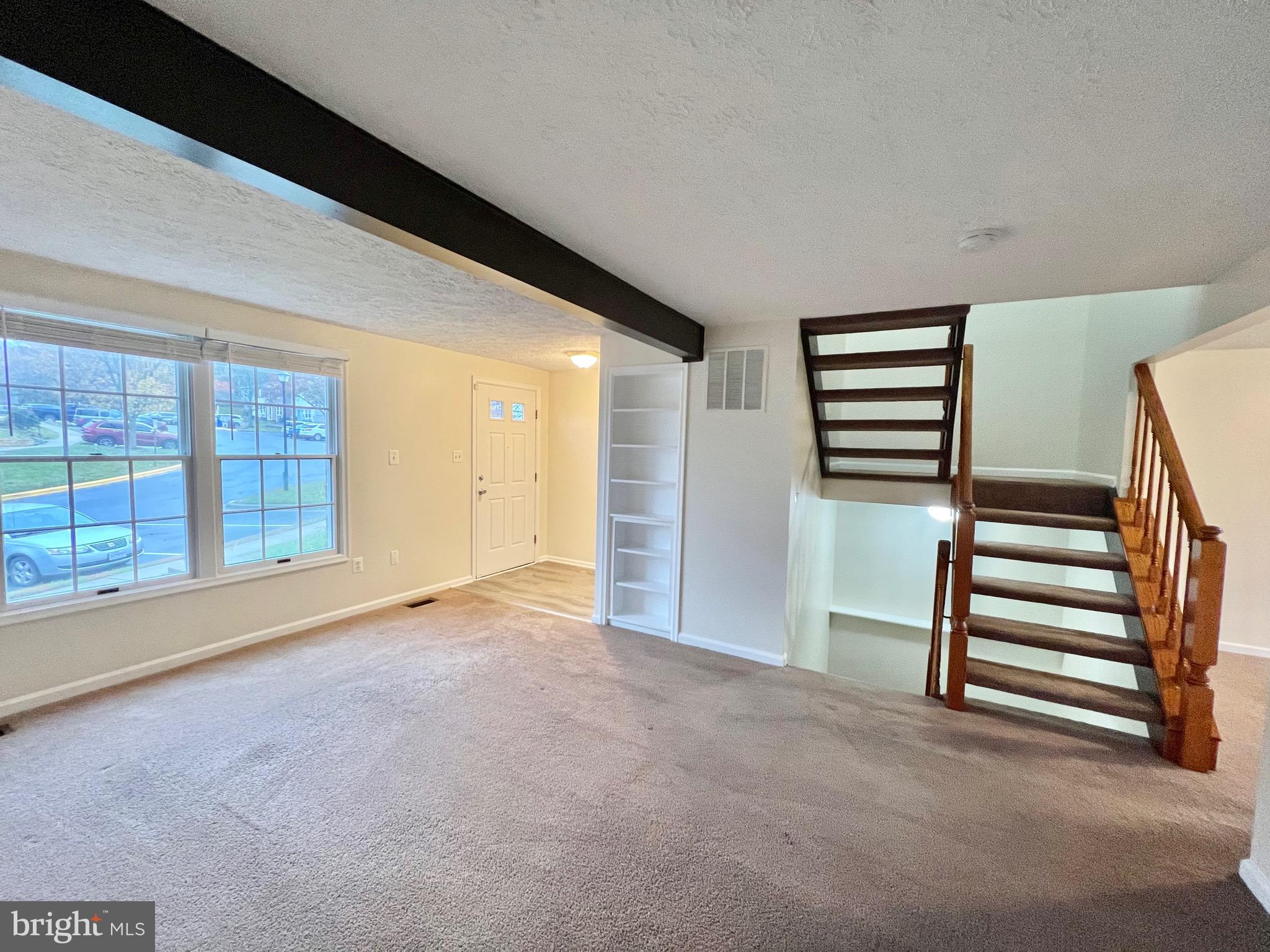 10129 Shelldrake Circle Damascus, MD 20872 - Photo 11 of 39 wooden floor in an empty room with a window