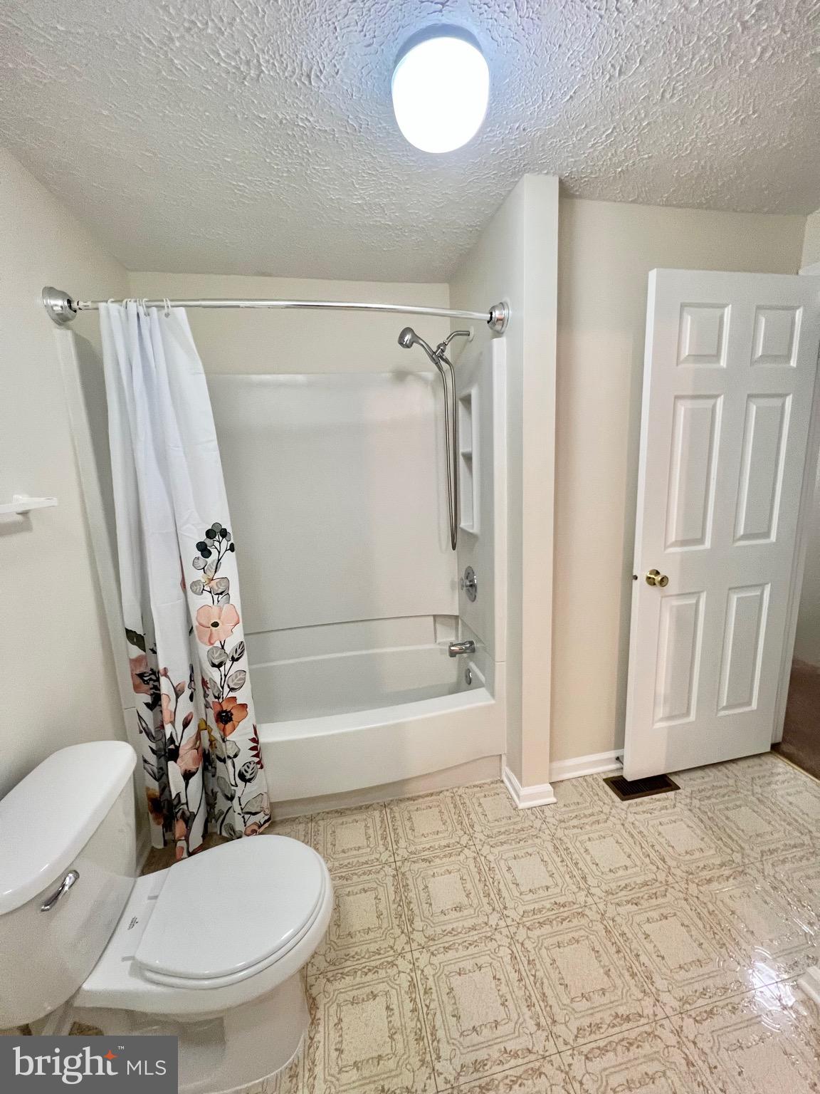 10129 Shelldrake Circle Damascus, MD 20872 - Photo 25 of 39 a bathroom with a sink toilet and shower