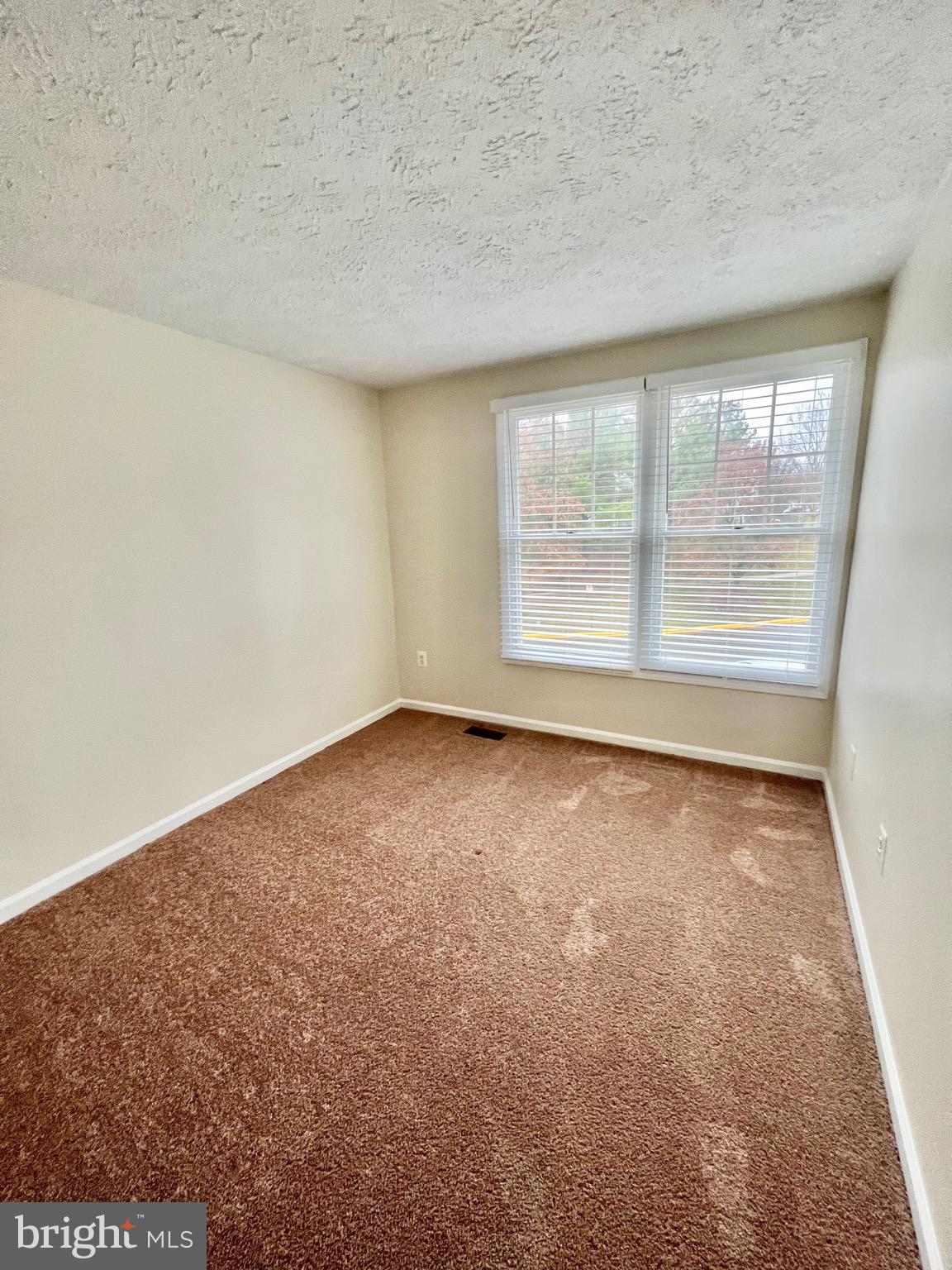 10129 Shelldrake Circle Damascus, MD 20872 - Photo 30 of 39 an empty room with a window
