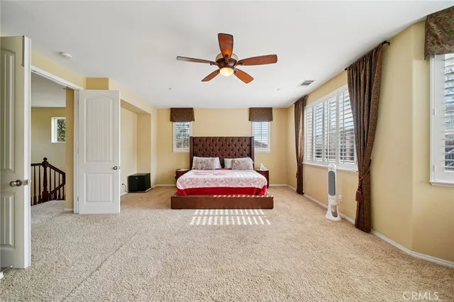 a living room with furniture a rug and a fireplace