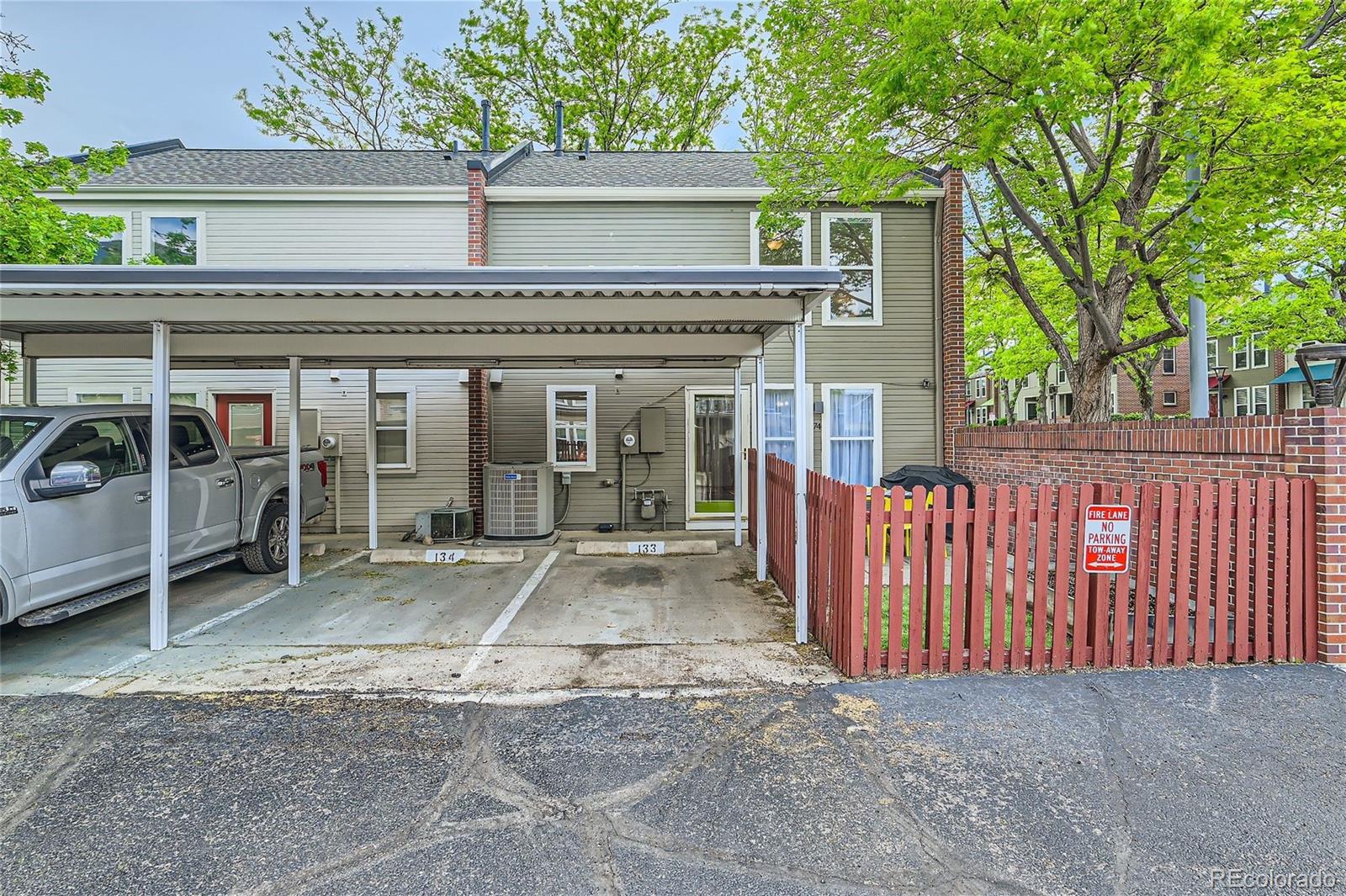 1150 Inca Street, Unit 74 Denver, CO 80204 - Photo 20 of 32 a view of a house with a porch and furniture