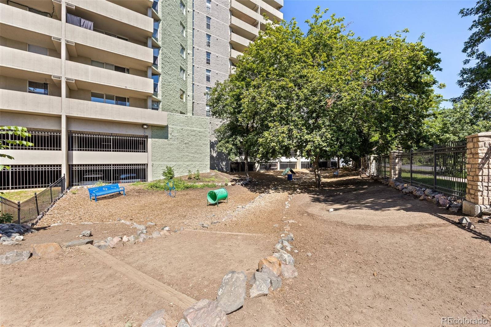 1150 Inca Street, Unit 74 Denver, CO 80204 - Photo 29 of 32 a view of a street with houses