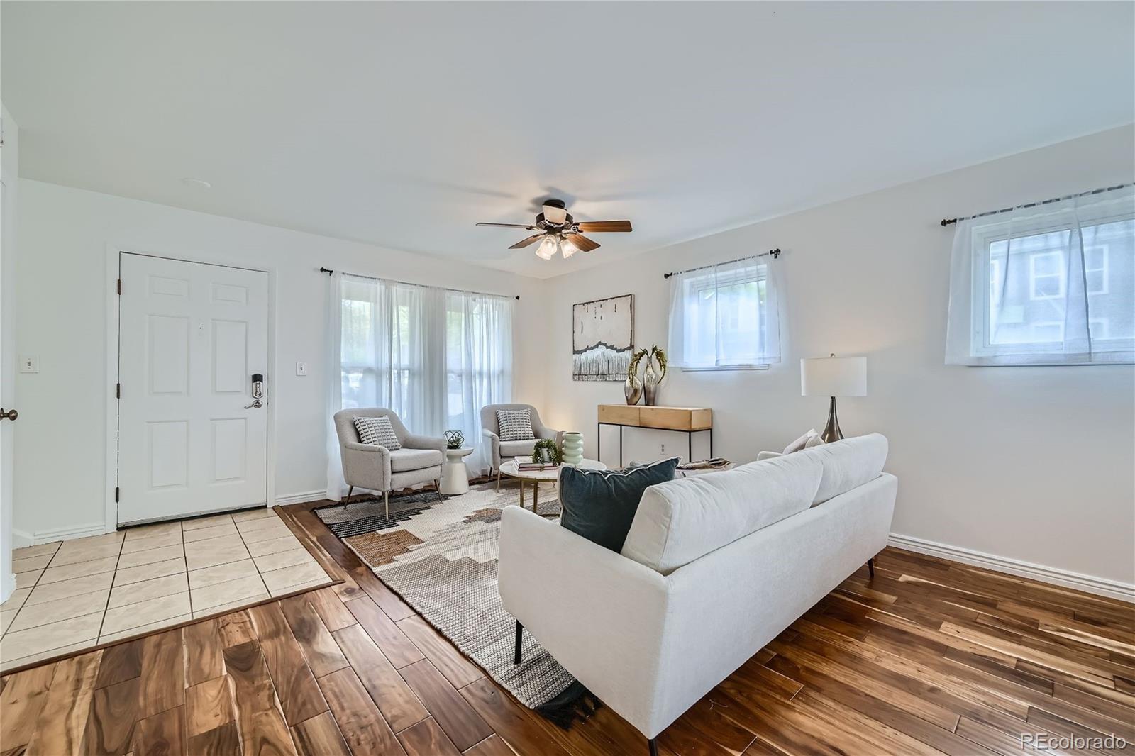 1150 Inca Street, Unit 74 Denver, CO 80204 - Photo 4 of 32 a living room with furniture