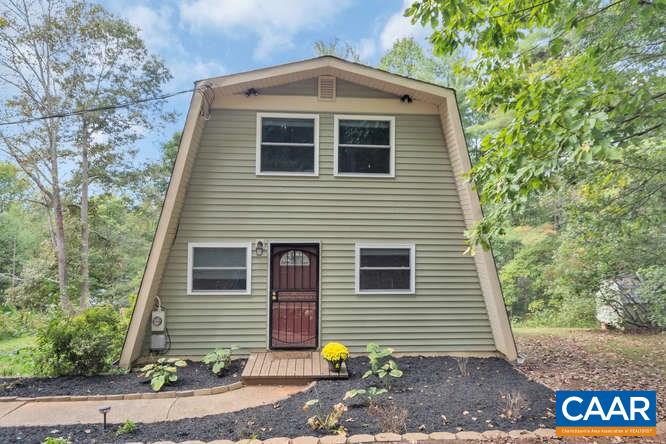 107 Goldenrod Road Ruckersville, VA 22968 - Photo 1 of 31 a front view of a house with garden