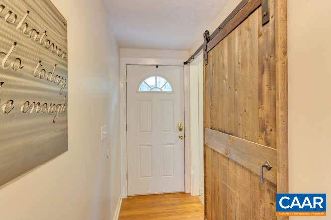 107 Goldenrod Road Ruckersville, VA 22968 - Photo 11 of 31 a view of front door with wooden floor