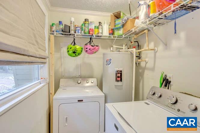 107 Goldenrod Road Ruckersville, VA 22968 - Photo 14 of 31 a utility room with a refrigerator and washer