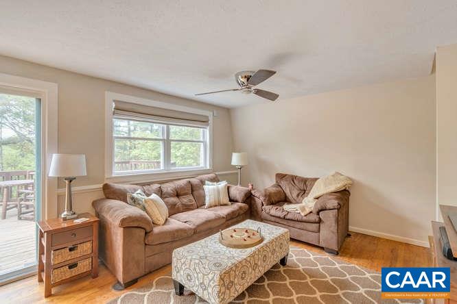 107 Goldenrod Road Ruckersville, VA 22968 - Photo 17 of 31 a living room with furniture and a window
