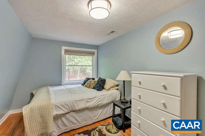 107 Goldenrod Road Ruckersville, VA 22968 - Photo 19 of 31 a bedroom with a bed and a window