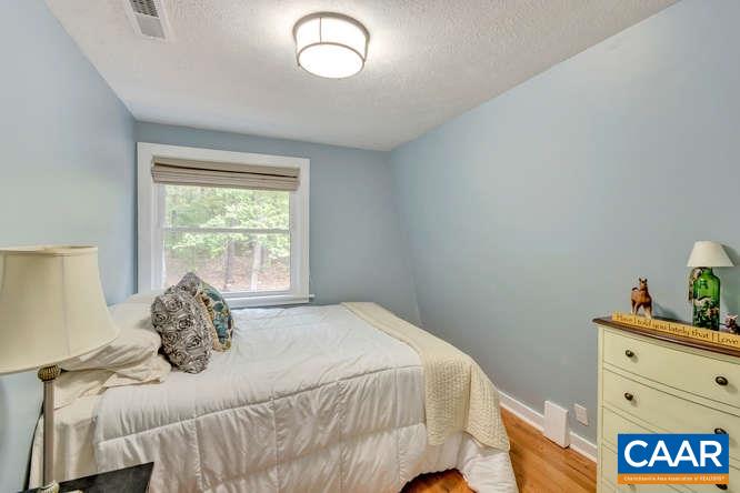 107 Goldenrod Road Ruckersville, VA 22968 - Photo 20 of 31 a bedroom with a bed and a window