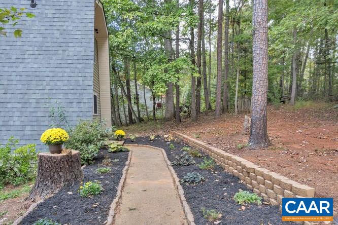 107 Goldenrod Road Ruckersville, VA 22968 - Photo 2 of 31 a backyard of a house with lots of green space