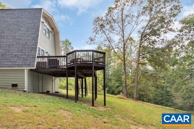 107 Goldenrod Road Ruckersville, VA 22968 - Photo 24 of 31 a view of a brick house with large windows